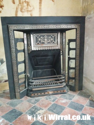 Attached picture cAST iRON fIREPLACE.jpg